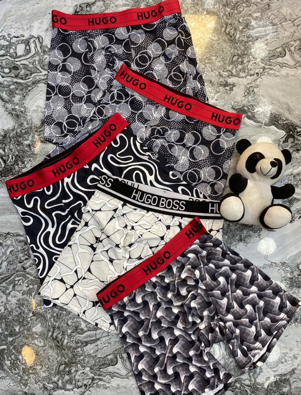 Boxer Calvin Klein hombre Colombia 2026 — CK Boxer Briefs y Trunks importados al por mayor desde $35.000 COP, colores negro blanco gris, Kikluxe mayorista dropshipping real Bogotá Medellín Cali