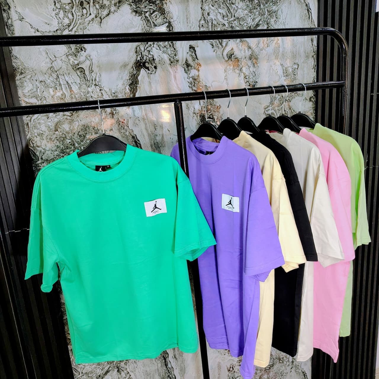 Camisetas oversized al por mayor Colombia 2026 — Calvin Klein, Tommy Hilfiger, Guess, Lacoste desde $35.000 COP, sin mínimo, dropshipping real, envíos 24-48h Bogotá Medellín Cali Kikluxe mayorista