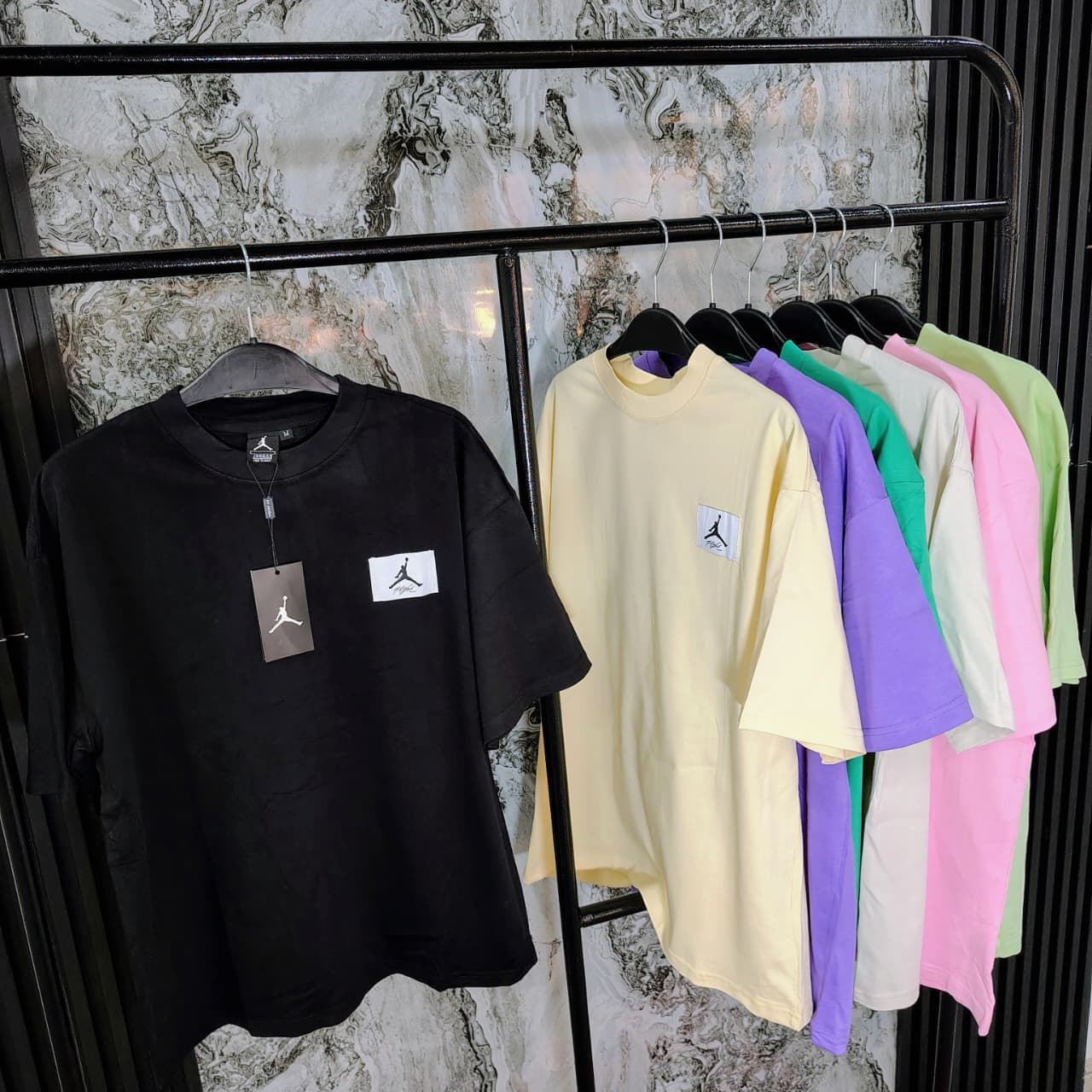 Camiseta oversized Calvin Klein al por mayor Colombia — importada original desde $35.000 COP, márgenes 80-140%, envíos 24-48h a toda Colombia sin mínimo, proveedor Kikluxe mayorista Bogotá Medellín Cali