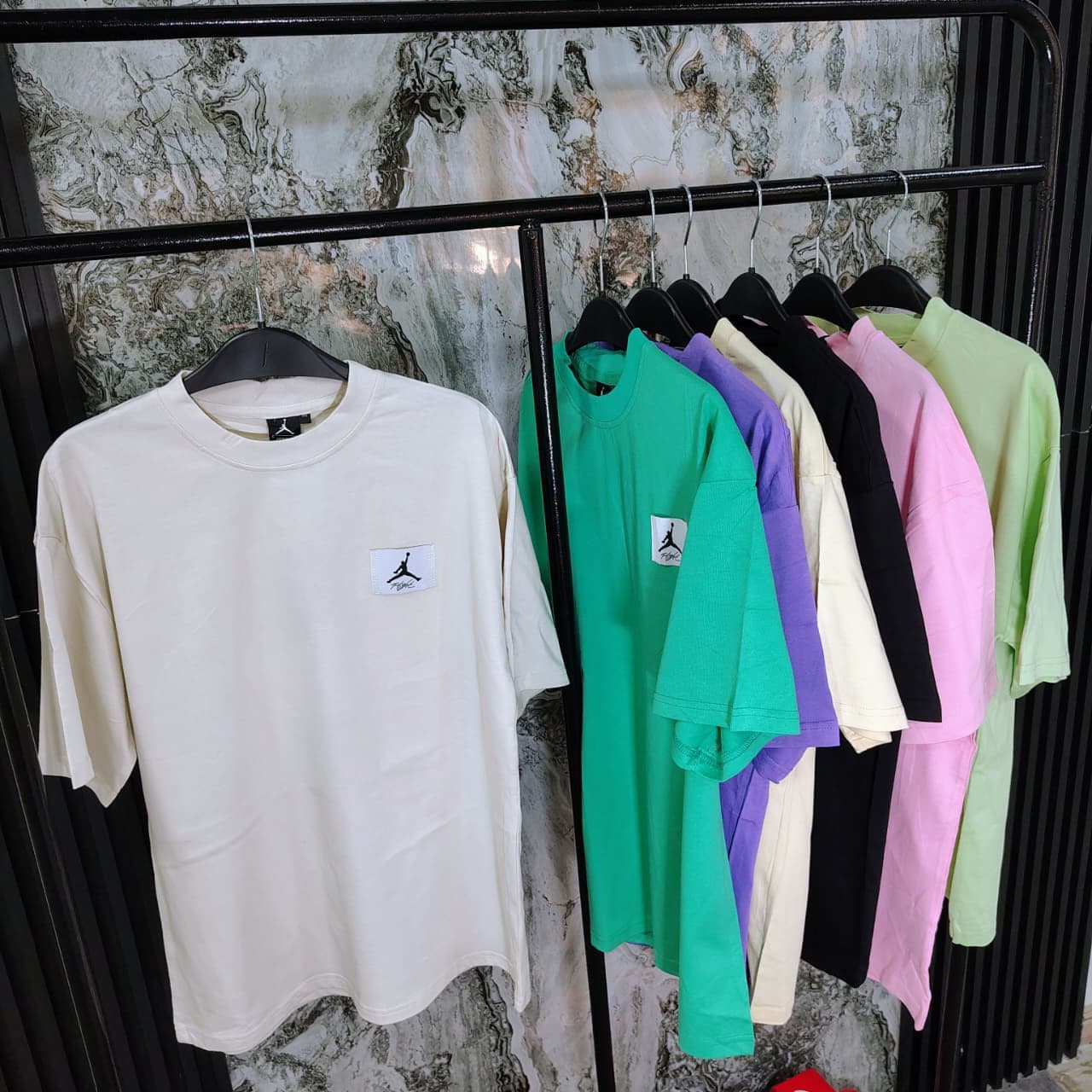 Camisetas oversized de marca tela fría al por mayor Colombia 2026 — Nike Dri-FIT y Adidas Aeroready desde $65.000 COP mayorista, margen 80-110% para revendedores en Bogotá, Medellín, Cali, Barranquilla y toda Colombia