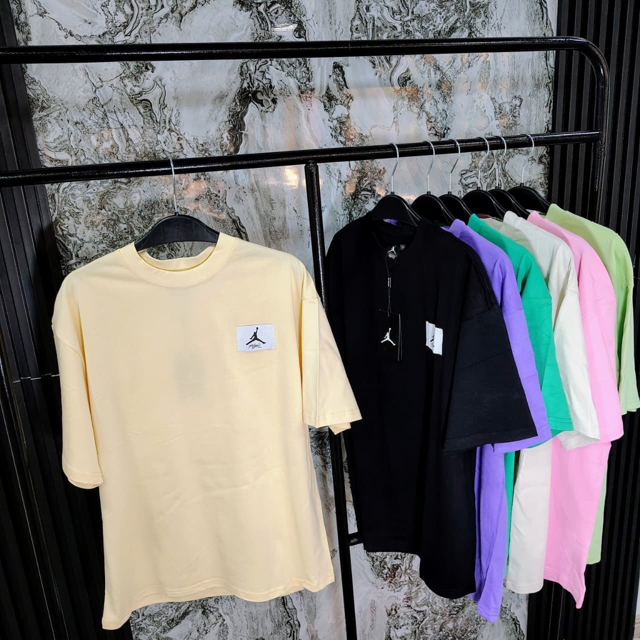 Camiseta oversized Tommy Hilfiger Colombia mayorista 2026 — Tommy Hilfiger, Guess, Lacoste desde $38.000 COP, dropshipping Bogotá, Medellín, Cali, Barranquilla, proveedor Kikluxe